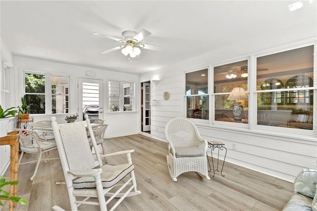 4875 Rivercliff Trce SW, Lilburn, GA 30047 - sunroom with wood finished floors