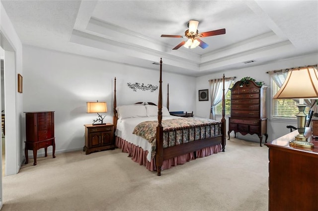 4875 Rivercliff Trce SW, Lilburn, GA 30047 - carpeted bedroom featuring a tray ceiling, crown molding, and a ceiling fan