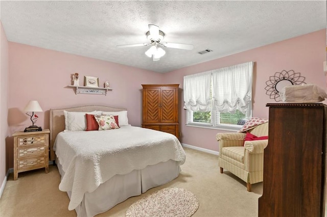4875 Rivercliff Trce SW, Lilburn, GA 30047 - bedroom with light carpet, ceiling fan, and a textured ceiling