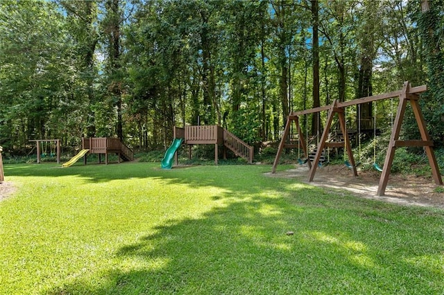 4875 Rivercliff Trce SW, Lilburn, GA 30047 - view of grassy yard featuring a playground
