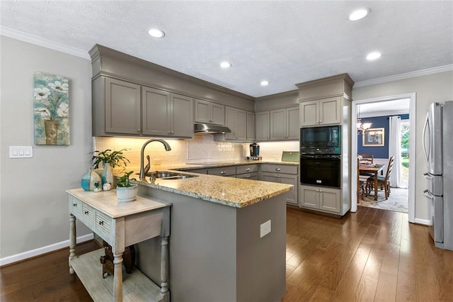 4875 Rivercliff Trce SW, Lilburn, GA 30047 - kitchen featuring black appliances, gray cabinetry, dark wood-style floors, light stone countertops, and crown molding