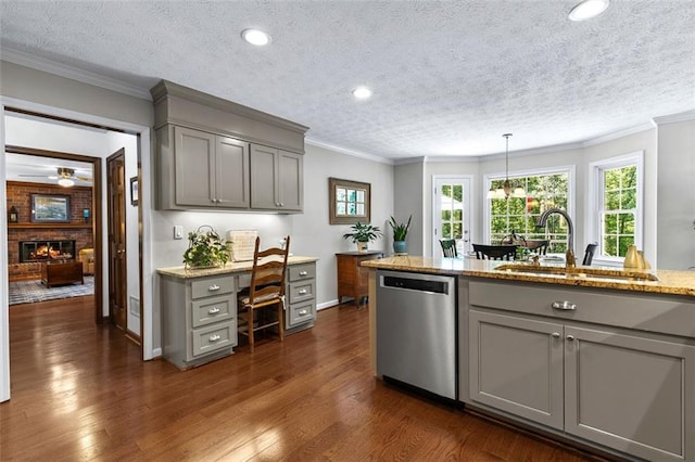 4875 Rivercliff Trce SW, Lilburn, GA 30047 - kitchen with dishwasher, gray cabinetry, a textured ceiling, healthy amount of natural light, and ornamental molding