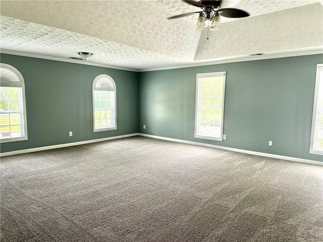 10175 Hemlock Way, Jonesboro, GA 30238 - spare room with a textured ceiling, ornamental molding, ceiling fan, carpet floors, and baseboards