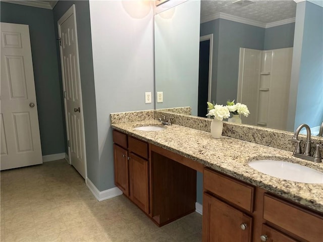 10175 Hemlock Way, Jonesboro, GA 30238 - bathroom featuring double vanity, baseboards, crown molding, and a shower