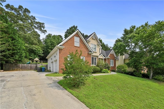 1920 Lee Patrick Dr, Dacula, GA 30019 - traditional-style house with brick siding, a garage, and concrete driveway