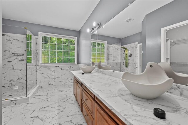 1920 Lee Patrick Dr, Dacula, GA 30019 - full bath with a marble finish shower, vanity, and marble finish flooring