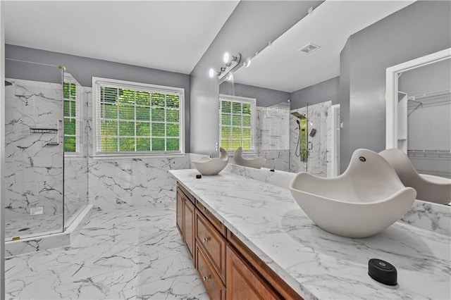 1920 Lee Patrick Dr, Dacula, GA 30019 - full bath with a marble finish shower, vanity, and marble finish flooring