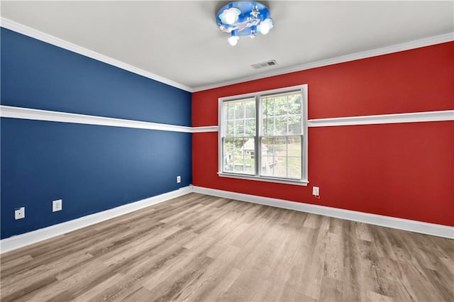 1920 Lee Patrick Dr, Dacula, GA 30019 - empty room featuring wood finished floors, baseboards, and ornamental molding