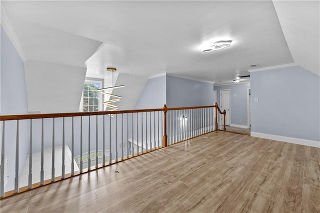 1920 Lee Patrick Dr, Dacula, GA 30019 - bonus room with wood finished floors, baseboards, and vaulted ceiling