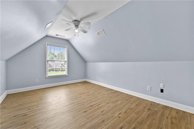 1920 Lee Patrick Dr, Dacula, GA 30019 - bonus room featuring ceiling fan, vaulted ceiling, light wood-type flooring, and baseboards