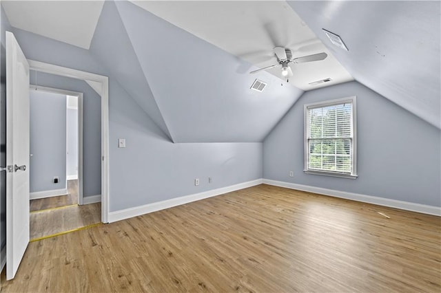 1920 Lee Patrick Dr, Dacula, GA 30019 - bonus room featuring light wood finished floors, lofted ceiling, baseboards, and ceiling fan