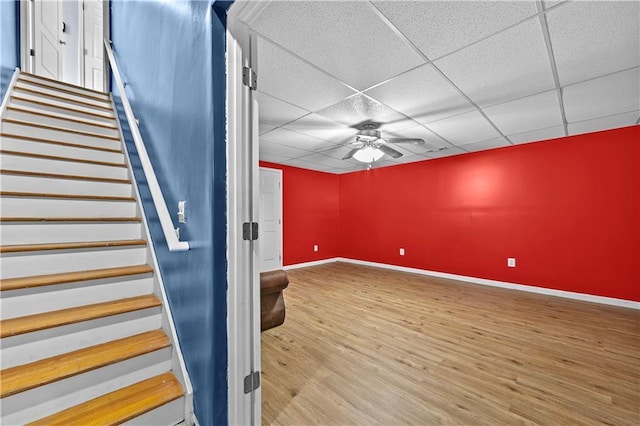 1920 Lee Patrick Dr, Dacula, GA 30019 - staircase with ceiling fan, baseboards, wood finished floors, and a paneled ceiling