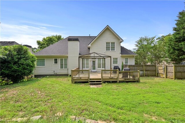1920 Lee Patrick Dr, Dacula, GA 30019 - rear view of house featuring a wooden deck and a shingled roof