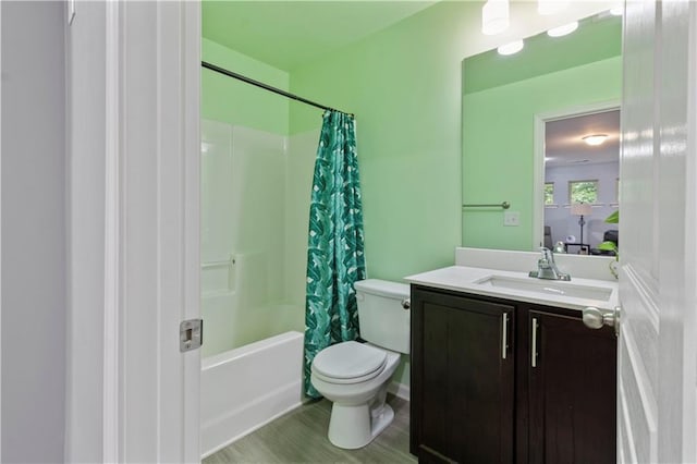 4746 Highland Ave, Sugar Hill, GA 30518 - bathroom with vanity, shower / bath combo with shower curtain, and wood finished floors