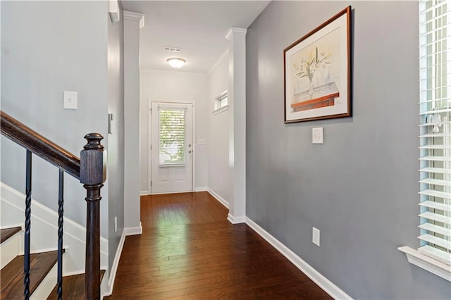 4746 Highland Ave, Sugar Hill, GA 30518 - foyer with crown molding, hardwood / wood-style floors, and stairway