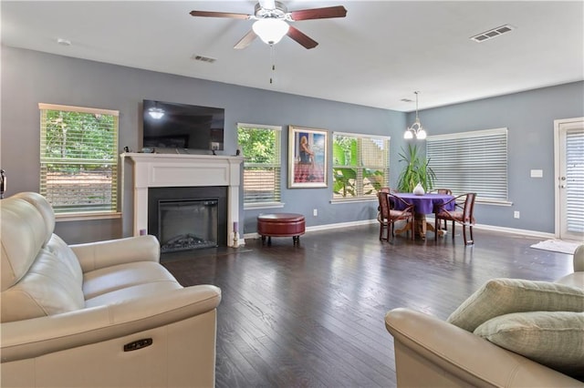 4746 Highland Ave, Sugar Hill, GA 30518 - living room with ceiling fan, dark wood-type flooring, a glass covered fireplace, and plenty of natural light