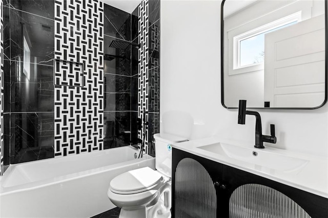 full bathroom featuring shower / washtub combination, toilet, and vanity