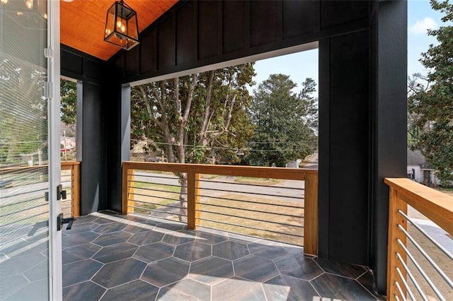 unfurnished sunroom with a healthy amount of sunlight