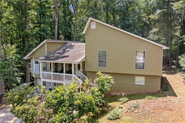 592 Ferry Creek Ct, Acworth, GA 30102 - view of front of property featuring a porch and a shingled roof