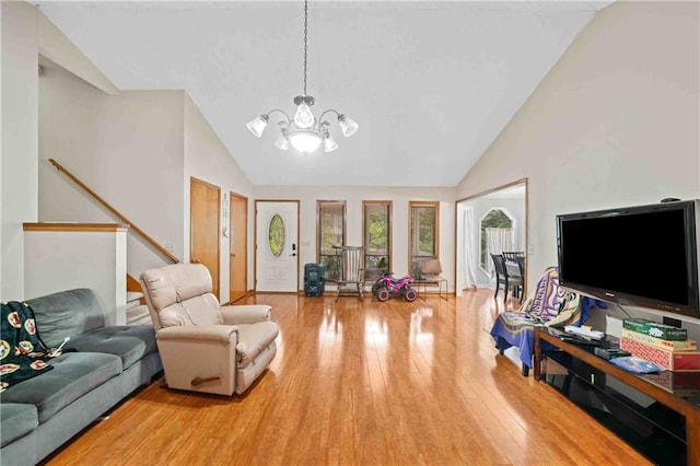 592 Ferry Creek Ct, Acworth, GA 30102 - living area featuring a chandelier, hardwood / wood-style flooring, and high vaulted ceiling