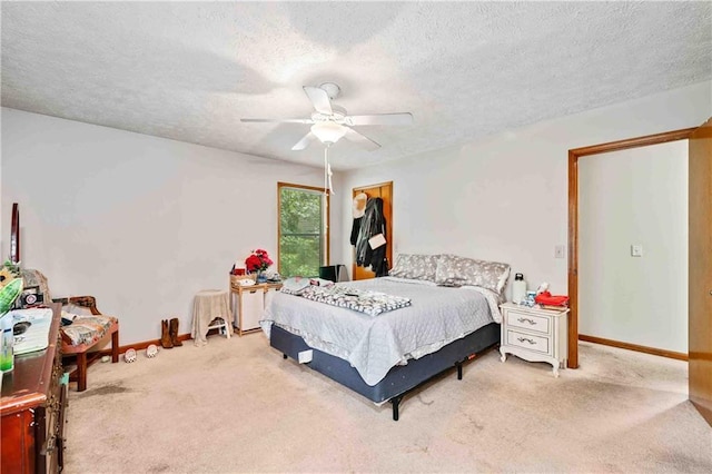 592 Ferry Creek Ct, Acworth, GA 30102 - carpeted bedroom with a textured ceiling and ceiling fan