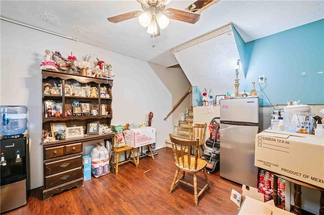 592 Ferry Creek Ct, Acworth, GA 30102 - kitchen with freestanding refrigerator, ceiling fan, wood finished floors, and a textured ceiling
