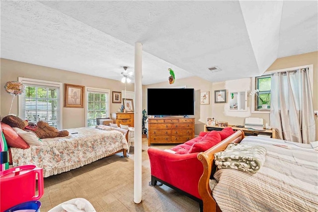 592 Ferry Creek Ct, Acworth, GA 30102 - bedroom featuring a textured ceiling, ceiling fan, and carpet
