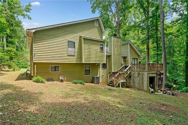 592 Ferry Creek Ct, Acworth, GA 30102 - back of house featuring stairway, a wooden deck, and a yard