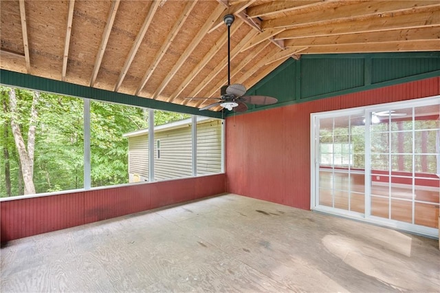 unfurnished sunroom with vaulted ceiling and ceiling fan