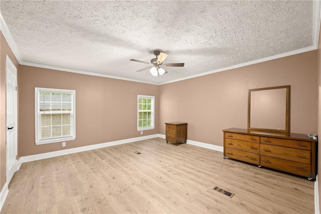 unfurnished bedroom with ceiling fan, crown molding, a textured ceiling, and light hardwood / wood-style flooring