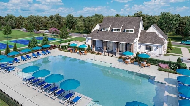 back of house featuring a community pool and a patio