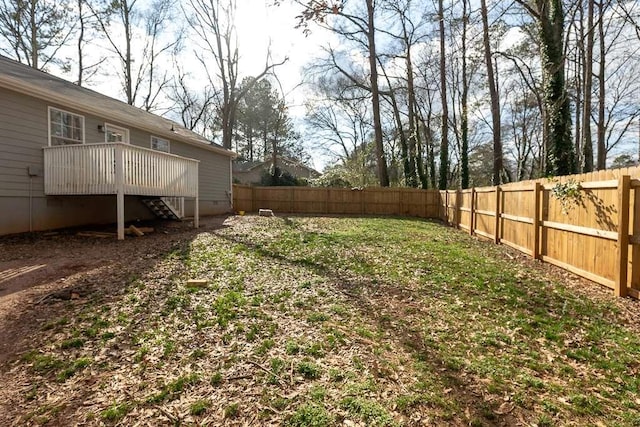 view of yard with a deck