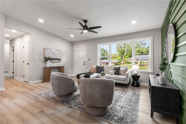 living area with light wood-style floors, recessed lighting, baseboards, and ceiling fan