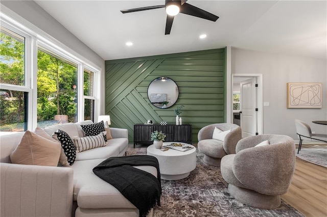 living room featuring recessed lighting, ceiling fan, and wood finished floors