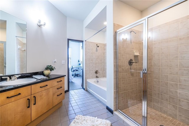 5300 Peachtree Rd Unit 3206, Atlanta, GA 30341 - full bath with a shower stall, tile patterned floors, a garden tub, and vanity