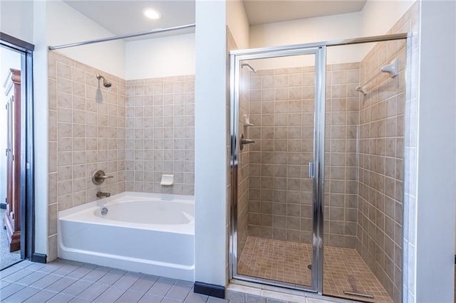 5300 Peachtree Rd Unit 3206, Atlanta, GA 30341 - full bathroom with recessed lighting, tile patterned flooring, a bath, and tiled shower