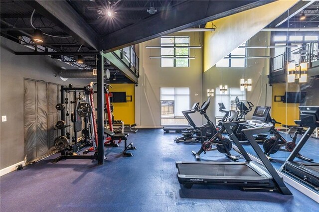 5300 Peachtree Rd Unit 3206, Atlanta, GA 30341 - gym with a towering ceiling and baseboards