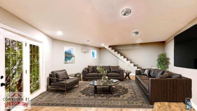 137 Rockville Springs Ct, Eatonton, GA 31024 - living area featuring stairs, recessed lighting, plenty of natural light, and wood finished floors