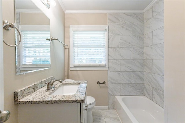 full bathroom featuring tiled shower / bath, ornamental molding, vanity, and plenty of natural light