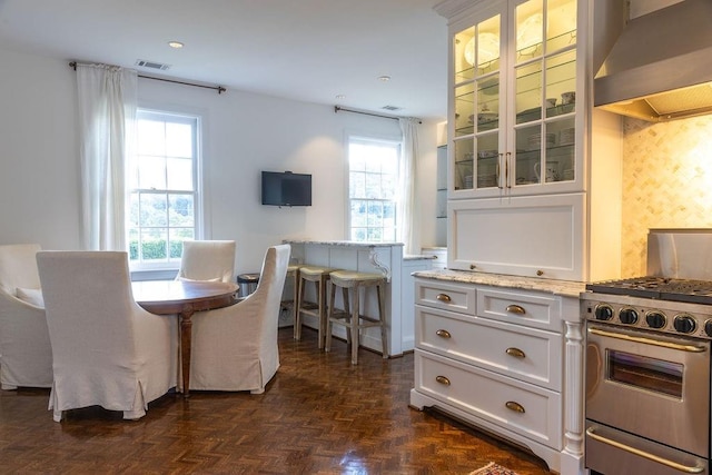 dining space featuring visible vents