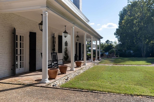 view of yard with french doors