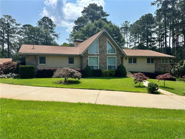 115 Cannongate Cir, Sharpsburg, GA 30277 - view of front of house featuring stone siding and a front lawn