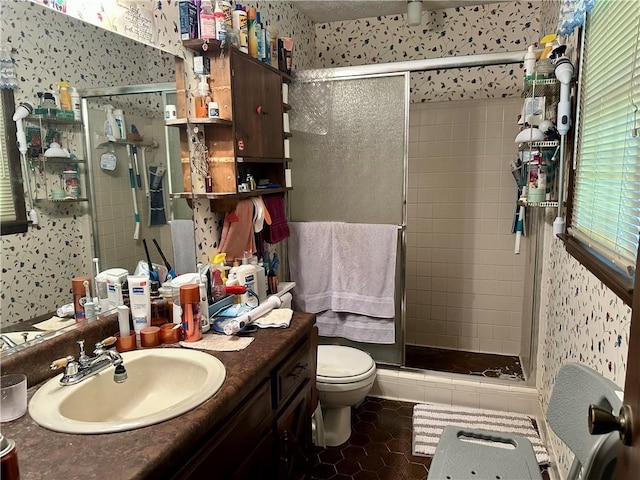 115 Cannongate Cir, Sharpsburg, GA 30277 - bathroom featuring wallpapered walls, a stall shower, vanity, and tile patterned flooring