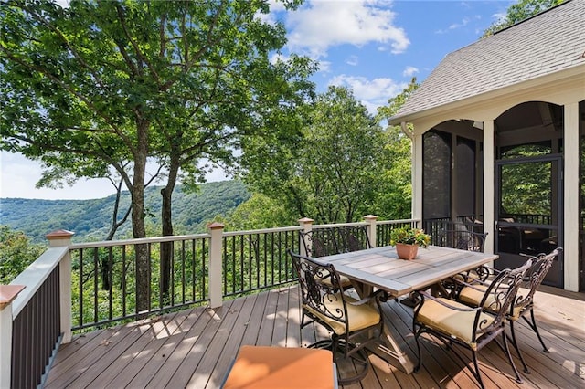 wooden terrace with a mountain view