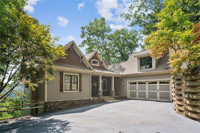 craftsman house with a garage