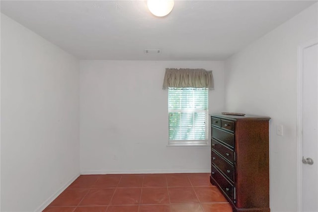 11354 Conner Ct, Hampton, GA 30228 - unfurnished bedroom with tile patterned flooring and baseboards