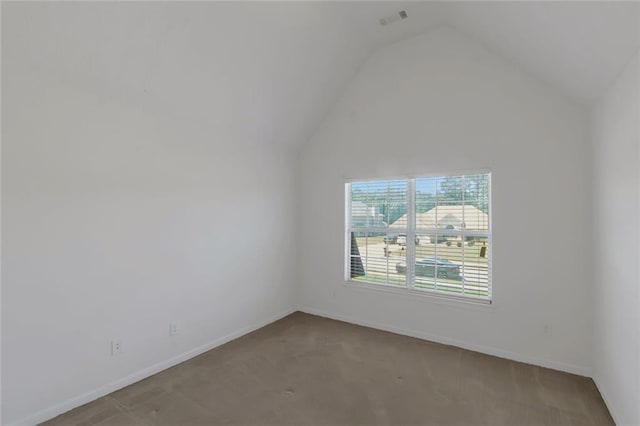 11354 Conner Ct, Hampton, GA 30228 - carpeted empty room featuring vaulted ceiling and baseboards