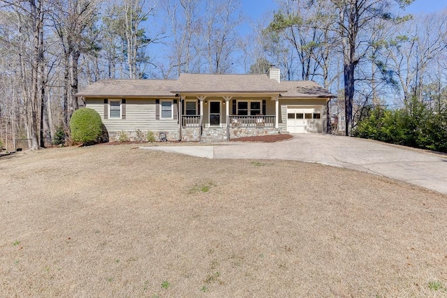 ranch-style home featuring a garage, covered porch, a chimney, and concrete driveway