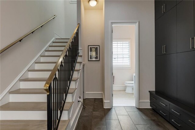stairway with baseboards