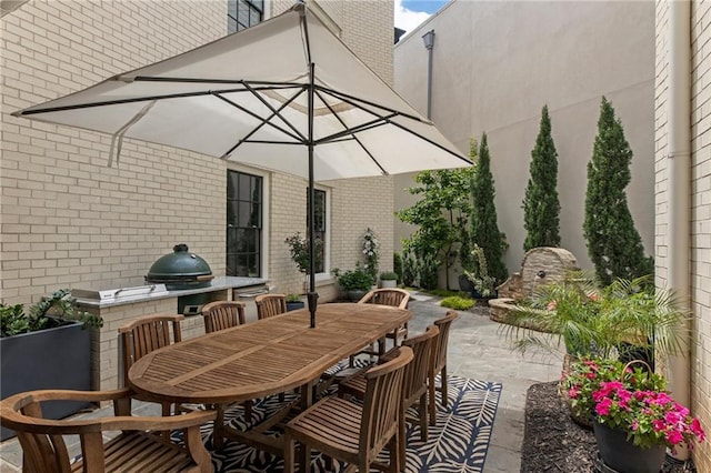 view of patio with outdoor dining area